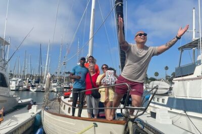 Experience Oceanside Sailing with Whales and dolphins! - Hoisting the Sails vs. Watching the Ocean: Your Choice on Board