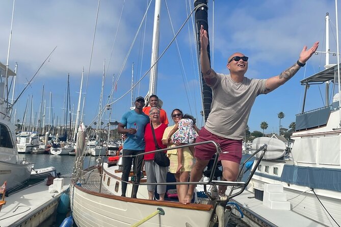 Experience Oceanside Sailing with Whales and dolphins! - Hoisting the Sails vs. Watching the Ocean: Your Choice on Board