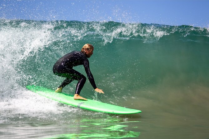 Leucadia Beach Surf Lessons - Paddle out together: learning wave-catching with real assistance