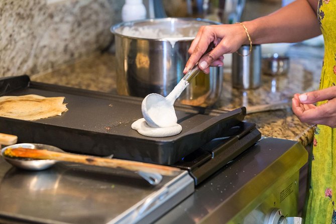 Private Cooking Demonstration of Indian Fusion Cuisine in San Diego - Dining at the table, with a little lake-adjacent calm