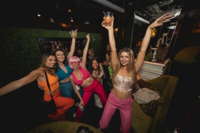 San Diego: Gaslamp Quarter Drink, Mingle & Dance Club Tour - Check-In at Vin de Syrah (901 Fifth Ave): Lights, Theme, and Your Welcome Shot