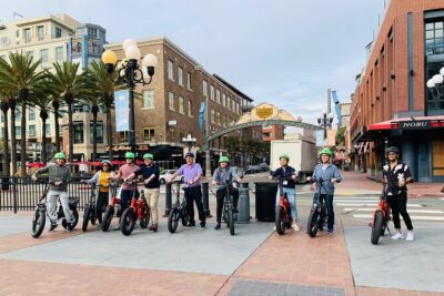 The Early Bird Guided E-Bike Tour in San Diego - USS Midway Museum area and the Unconditional Surrender memorial stop