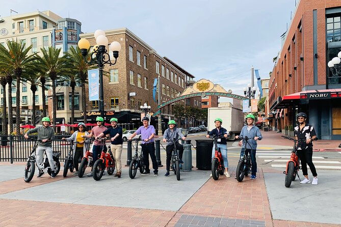 The Early Bird Guided E-Bike Tour in San Diego - USS Midway Museum area and the Unconditional Surrender memorial stop